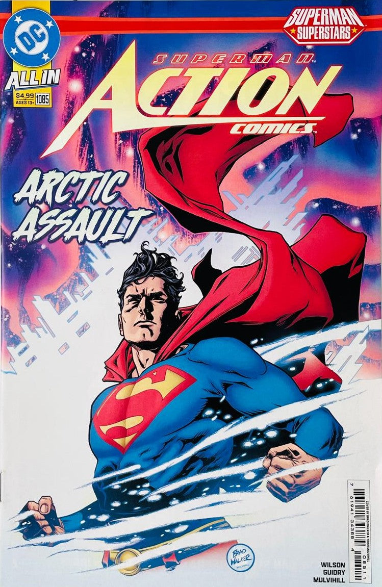 Superman flying upward through a heavy blizzard in front of the Fortress of Solitude under the text Arctic Assault on the cover of Action Comics 1085 by Brad Walker for DC Comics.