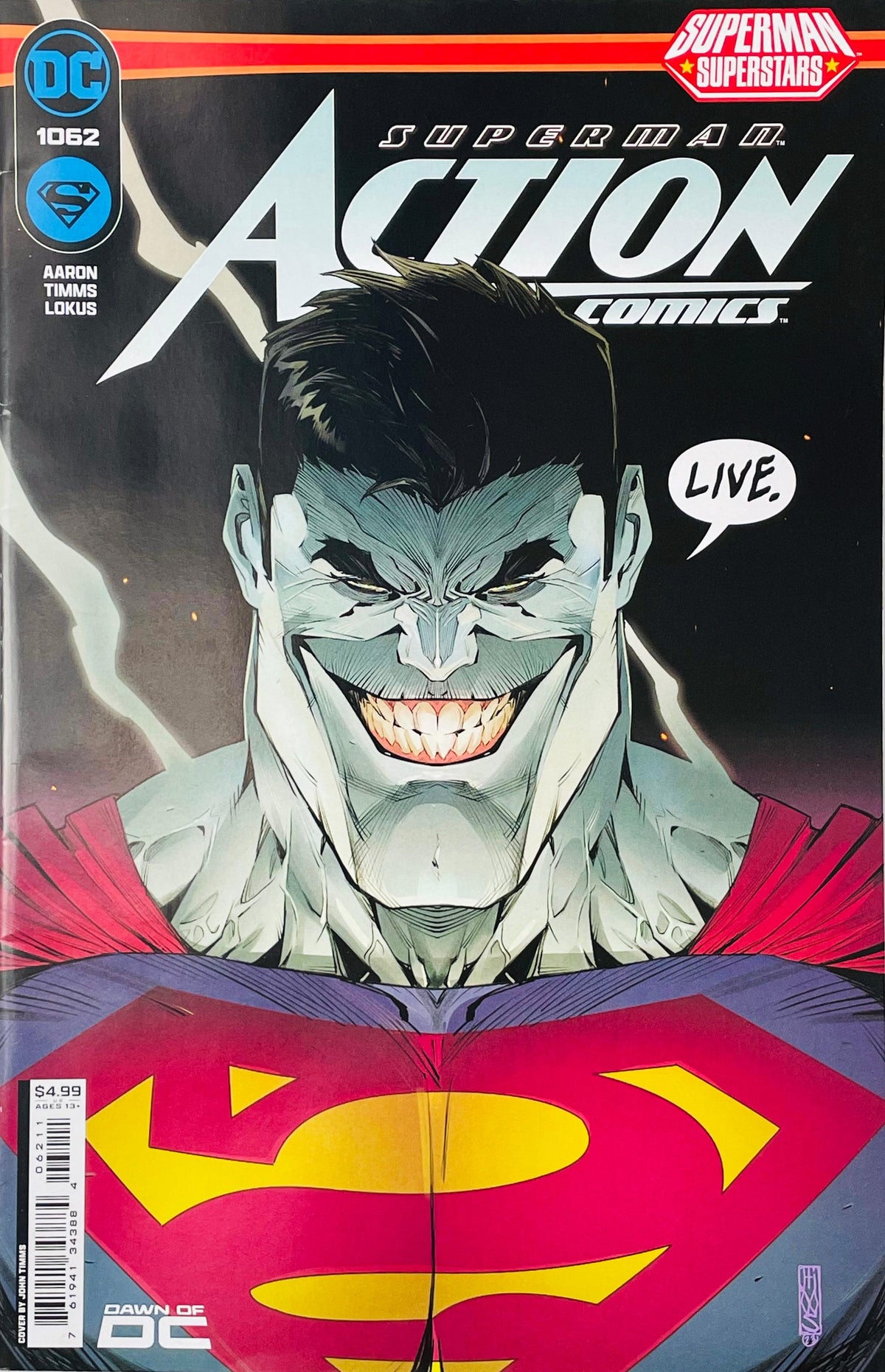 Close-up portrait of Bizarro grinning with a speech bubble saying LIVE on the main cover of Action Comics 1062.