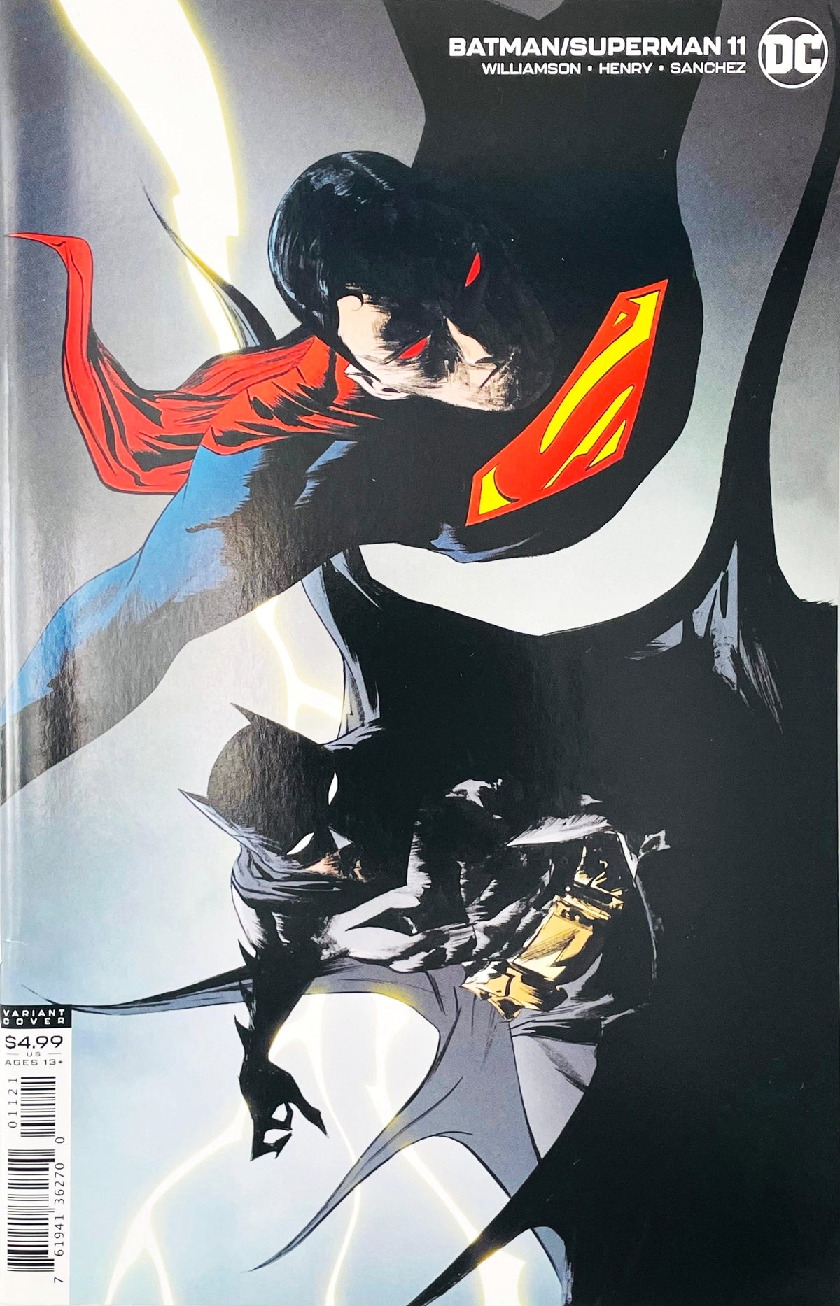 Superman diving down with glowing red heat vision eyes beside Batman on the Clay Mann variant cover of Batman Superman 11.