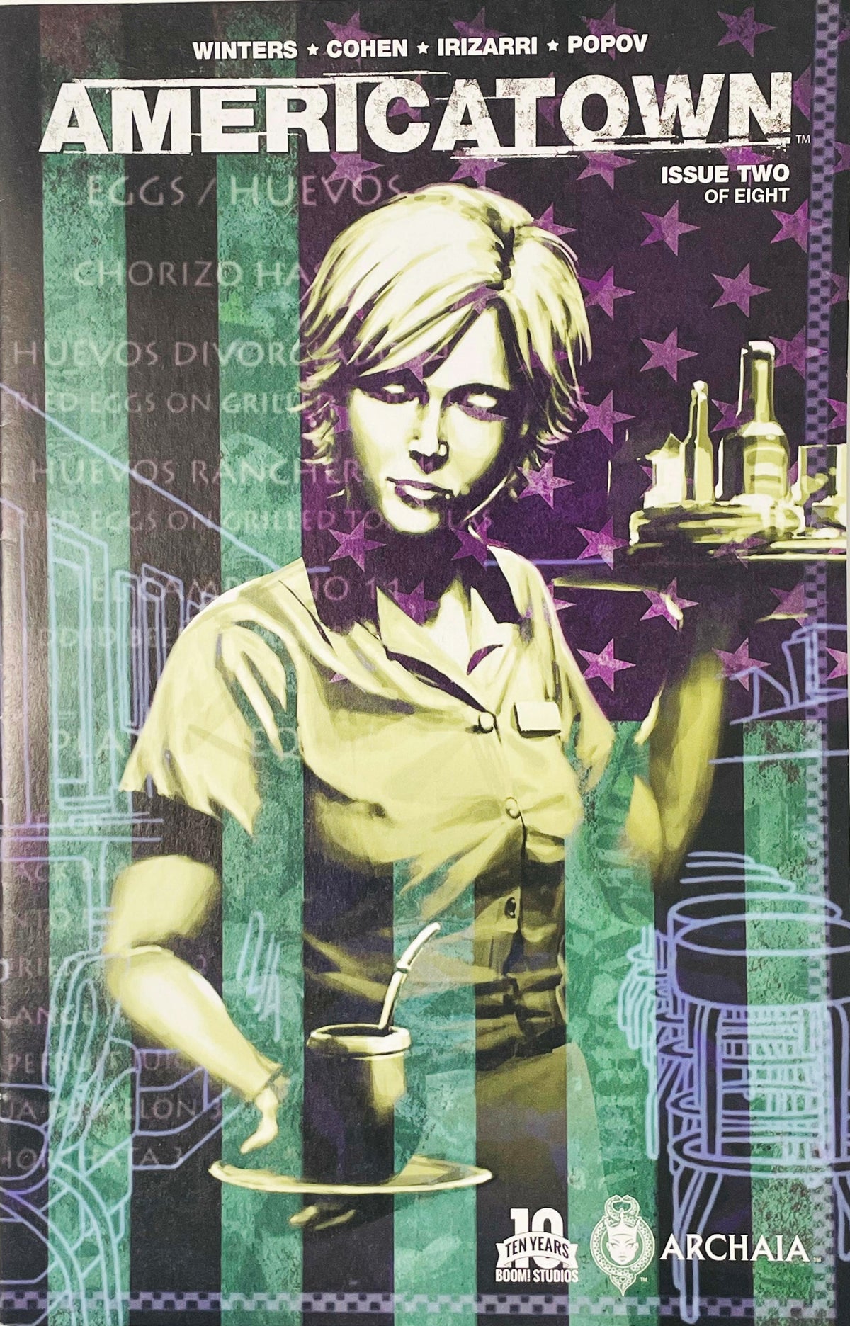 Blonde waitress carrying a tray with drinks set against a stylized American flag and menu text on cover of Americatown issue 2.