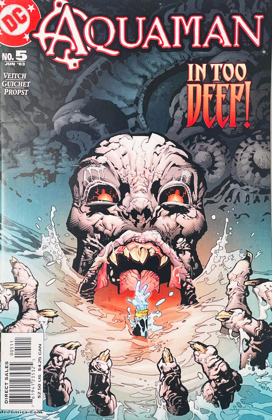 Aquaman glowing water hand reaching out from the open mouth of a sea monster on cover of Aquaman issue 5.