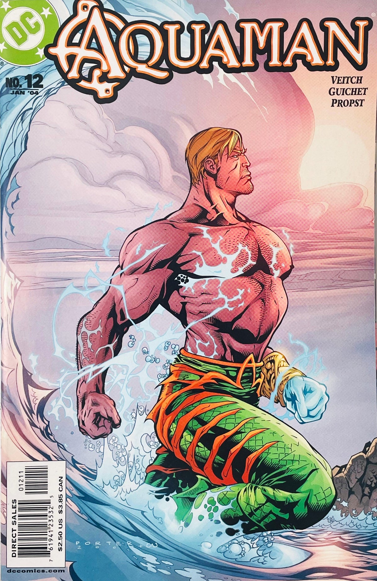 Shirtless Aquaman with glowing elemental water power rising from ocean surf on Howard Porter cover of Aquaman issue 12.