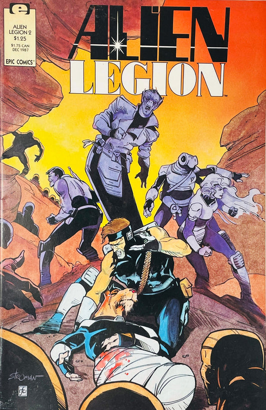 Alien Legion members navigating a rugged rocky landscape under an orange sky with a soldier cradling a fallen comrade on the cover of issue 2 illustrated by Larry Stroman.